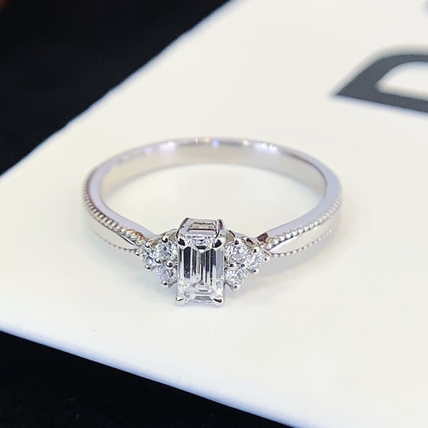18K Gold Emerald Cut Lab-Grown Diamond Side Stone Engagement Ring