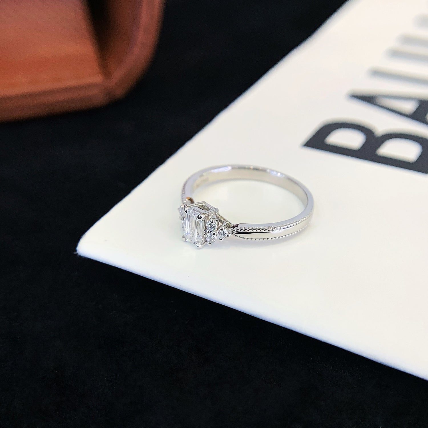 18K Gold Emerald Cut Lab-Grown Diamond Side Stone Engagement Ring