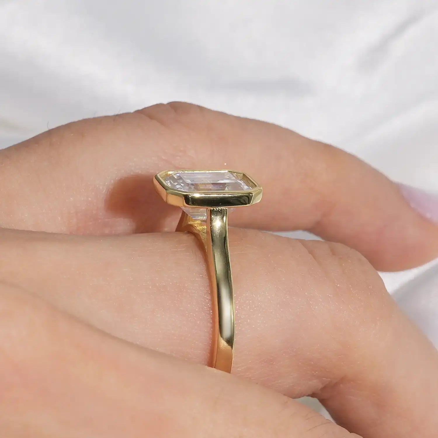 Bezel Set Engagement Ring with 3CT Emerald Cut Diamond