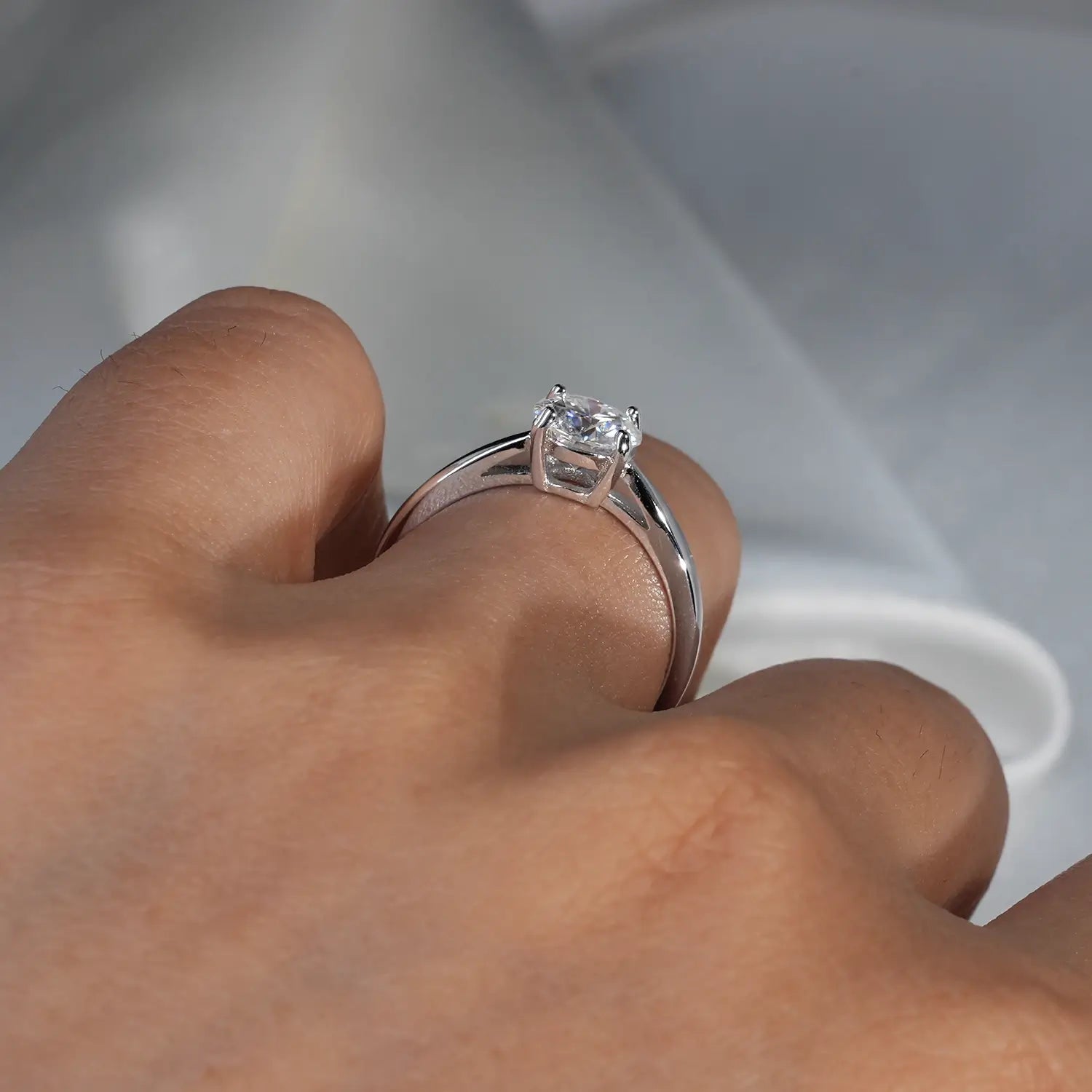 Classic Four-Prong Round Cut Moissanite Diamond Engagement Ring