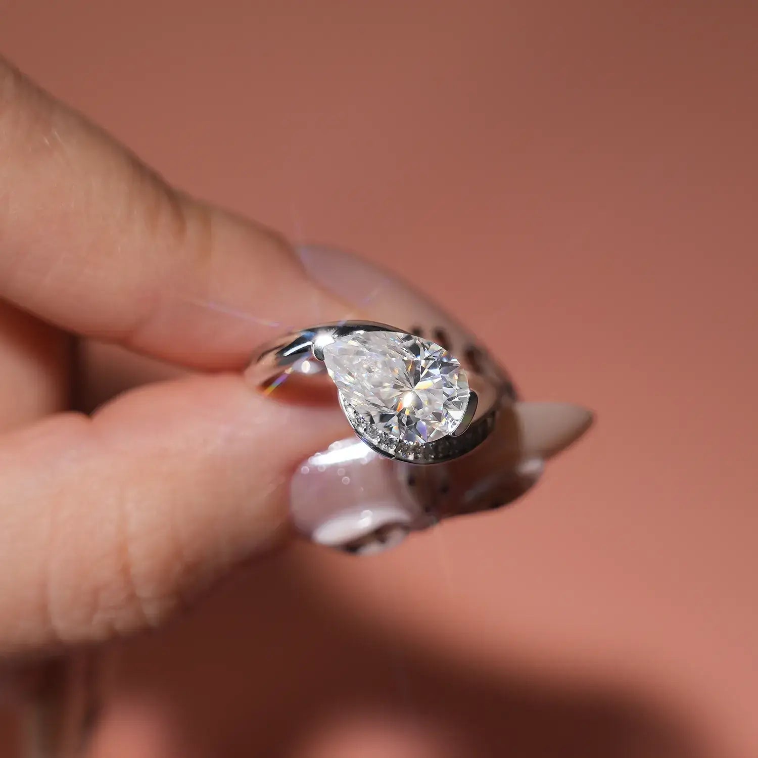 Bypass Eastwast Pear Cut Moissanite Diamond Channel Pave Engagement Ring